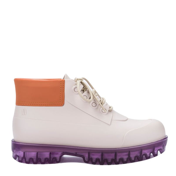 Bota coturno Melissa Ares nas cores bege, laranja e lilás, com design robusto, solado tratorado e cano médio – modelo moderno e estiloso para adultos.

Palavra-chave principal:
Melissa Ares

Palavras-chave relacionadas:
Bota coturno Melissa
Melissa Ares bege
Coturno colorido Melissa
Bota tratorada feminina
Melissa cano médio
Bota estilosa Melissa
Coturno vegano
Melissa inverno 2025
Calçado casual Melissa
Bota moderna feminina