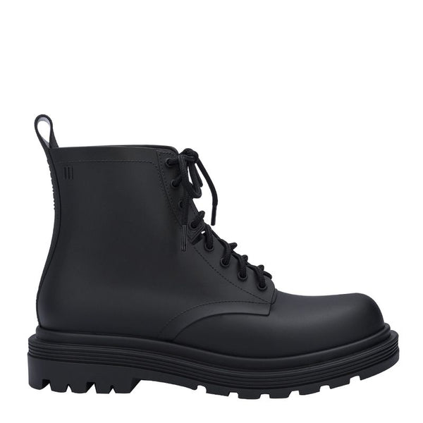 Coturno Melissa adulto na cor preta, com acabamento fosco, cano médio e solado tratorado – ideal para compor looks urbanos e modernos.

Palavra-chave principal:
Melissa Coturno Adulto

Palavras-chave relacionadas:
Coturno Melissa preto
Bota Melissa feminina
Melissa tratorado
Coturno vegano Melissa
Melissa inverno 2025
Calçado feminino preto
Bota urbana Melissa
Melissa 32822
Coturno casual feminino
Melissa cano médio