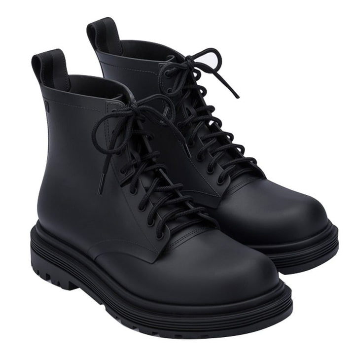 Coturno Melissa adulto na cor preta, com acabamento fosco, cano médio e solado tratorado – ideal para compor looks urbanos e modernos.

Palavra-chave principal:
Melissa Coturno Adulto

Palavras-chave relacionadas:
Coturno Melissa preto
Bota Melissa feminina
Melissa tratorado
Coturno vegano Melissa
Melissa inverno 2025
Calçado feminino preto
Bota urbana Melissa
Melissa 32822
Coturno casual feminino
Melissa cano médio