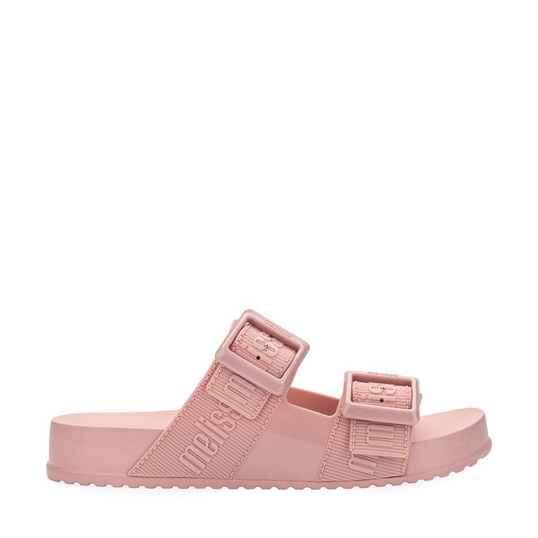 Chinelo adulto Melissa Cozy Slide M.Lover na cor rosa, com duas tiras largas ajustáveis com fivelas e logo em relevo. Feito em Melflex, possui solado tratorado e palmilha anatômica. Ideal para compor looks casuais com conforto e estilo despojado.

Palavra-chave principal: Melissa Cozy Slide M.Lover
Palavras-chave relacionadas: chinelo rosa, slide adulto, tiras com fivela, Melflex, solado tratorado, conforto, calçado casual feminino.
