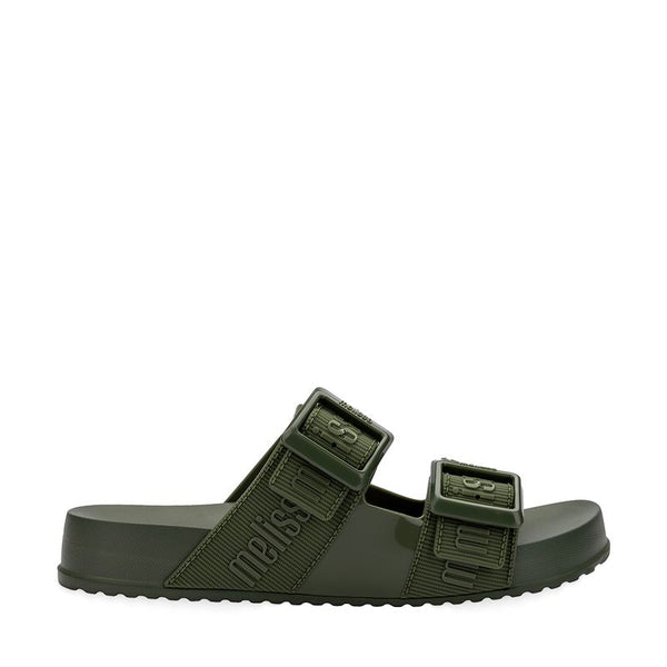 Chinelo adulto Melissa Cozy Slide M.Lover na cor verde, com duas tiras largas ajustáveis com fivela e logo em relevo. Produzido em Melflex, possui solado tratorado e palmilha anatômica. Ideal para looks casuais com conforto, estilo e atitude.

Palavra-chave principal: Melissa Cozy Slide M.Lover
Palavras-chave relacionadas: chinelo verde, tiras com fivela, Melflex, slide adulto, solado tratorado, conforto, calçado casual estiloso.