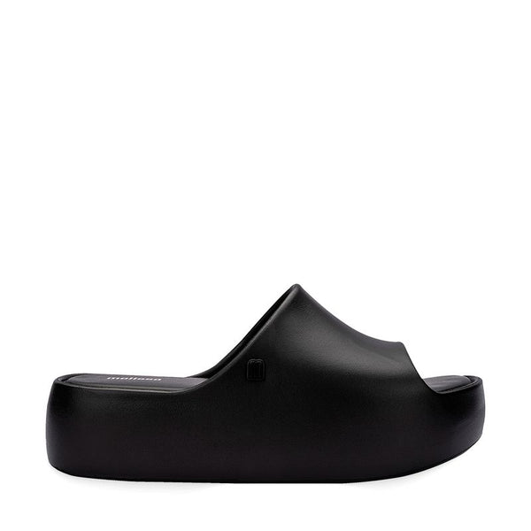 Sandália Melissa Free Platform Slide adulto na cor bege, com tira larga, solado plataforma e design minimalista – calçado moderno, confortável e versátil para o dia a dia.

Palavra-chave principal:
Melissa Free Platform Slide

Palavras-chave relacionadas:
Melissa 35859, slide bege Melissa, sandália plataforma Melissa, calçado confortável, Melissa com tira larga, sandália minimalista, Melissa casual, sandália moderna, Melissa dia a dia, plataforma bege
