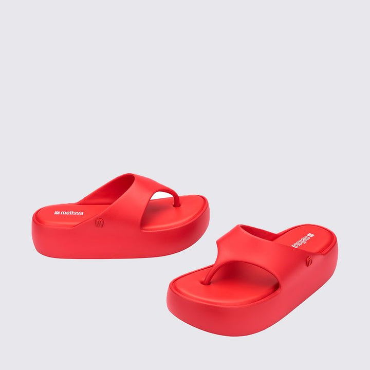 Sandália Melissa Free Platform Thong adulto na cor vermelha, com design de dedo, solado plataforma e tiras largas – calçado moderno, confortável e marcante para o dia a dia.

Palavra-chave principal:
Melissa Free Platform Thong

Palavras-chave relacionadas:
Melissa 36088, sandália de dedo vermelha, plataforma Melissa, calçado confortável Melissa, sandália moderna, tiras largas Melissa, Melissa vermelha adulto, chinelo plataforma, sandália casual feminina, slide Melissa adulto