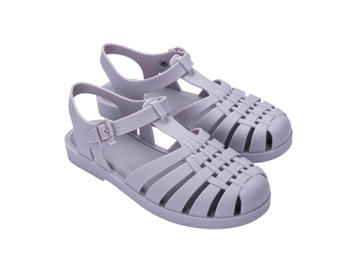 Sandália Melissa Possession adulto na cor cinza, com tiras estilo fisherman, fechamento em fivela lateral e solado reto – calçado clássico, leve e confortável.

Palavra-chave principal:
Melissa Possession Adulto

Palavras-chave relacionadas:
Melissa 32408, sandália cinza Melissa, Melissa fisherman, sandália com fivela, calçado confortável adulto, Melissa clássica, sandália retrô, Melissa casual, calçado leve feminino, sandália adulta 
