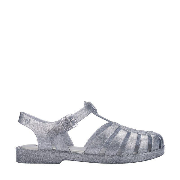 Sandália Melissa Possession Shiny adulto na cor vidro glitter, com tiras estilo fisherman, fechamento em fivela e acabamento brilhante – calçado retrô, leve e confortável.

Palavra-chave principal:
Melissa Possession Shiny

Palavras-chave relacionadas:
Melissa 33520, sandália vidro glitter, Melissa brilho, sandália fisherman Melissa, Melissa com fivela, calçado confortável adulto, Melissa retrô, sandália transparente brilhante, Melissa clássica, sandália leve adulto