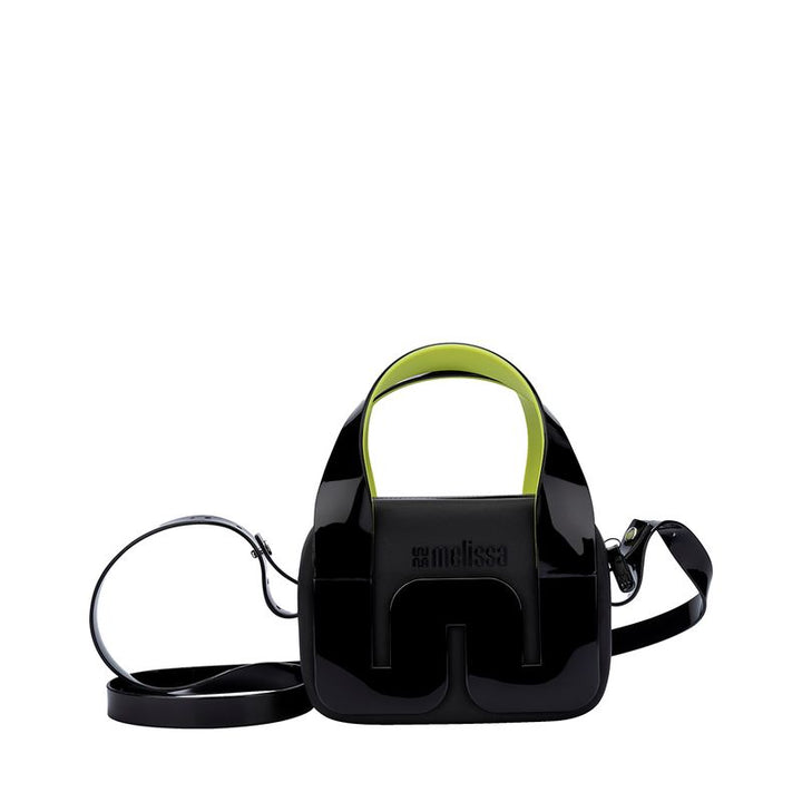 Bolsa Melissa Station Bag nas cores preto e verde, com formato estruturado, alça ajustável e fechamento por zíper – acessório moderno, versátil e prático para o dia a dia.

Palavra-chave principal:
Melissa Station Bag

Palavras-chave relacionadas:
Melissa 34451, bolsa preto verde, bolsa estruturada Melissa, Melissa com alça ajustável, bolsa feminina com zíper, acessório Melissa, bolsa casual e moderna, bolsa prática Melissa, Melissa fashion, bolsa estilosa