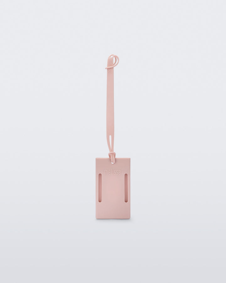 Tag de mala Melissa Station na cor rosa, com formato retangular, detalhe da marca em alto-relevo e alça ajustável – acessório funcional, resistente e estiloso para viagens.

Palavra-chave principal:
Melissa Station Tag

Palavras-chave relacionadas:
Tag de mala Melissa, Melissa 34467, tag rosa Melissa, acessório de viagem Melissa, etiqueta de bagagem, tag para mala feminina, Melissa funcional, tag com alça, tag resistente Melissa, tag personalizada Melissa