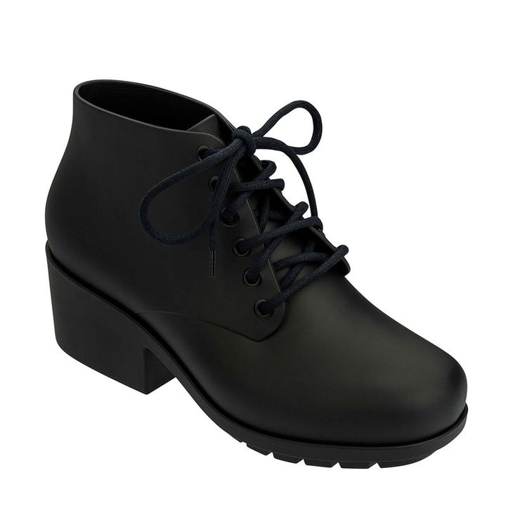 Bota coturno Melissa Stellar II preta com acabamento fosco, cano médio e solado tratorado – calçado feminino moderno e versátil.

Palavra-chave principal:
Melissa Stellar II

Palavras-chave relacionadas:
Melissa coturno
Bota coturno Melissa
Coturno Melissa preto
Bota Melissa feminina
Melissa cano médio
Bota Melissa fosca
Bota tratorada Melissa
Melissa inverno 2025
Coturno vegano Melissa
Bota preta Melissa