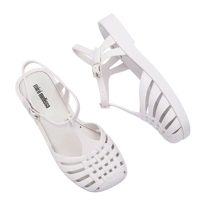 Sandália Mini Melissa Aranha Quadrada infantil na cor branca, com tiras estilo fisherman, bico quadrado e fecho lateral – calçado leve, clássico e confortável para crianças.

Palavra-chave principal:
Mini Melissa Aranha Quadrada

Palavras-chave relacionadas:
Melissa 33486, sandália branca infantil, Melissa aranha branca, sandália bico quadrado, sandália fisherman infantil, calçado confortável Melissa, Melissa clássica infantil, sandália leve criança, Melissa com fecho lateral, Mini Melissa branca