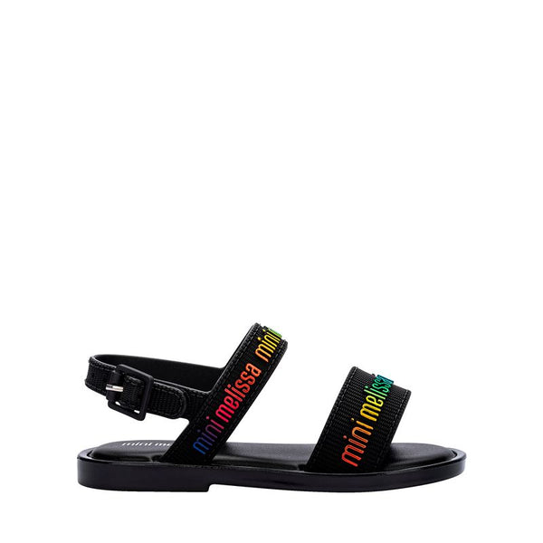 Sandália infantil Mini Melissa Mar Sandal M.Lover Baby na cor preta com tiras em formato de corações multicoloridos. Produzida em Melflex, é leve, confortável e possui fechamento ajustável, ideal para os primeiros passos das crianças com muito estilo, diversão e segurança."

Palavra-chave principal: Sandália infantil Mini Melissa Mar Sandal
Palavras-chave relacionadas: preto multicolorido, Melflex, corações coloridos, sandália baby, conforto, primeiros passos, calçado infantil estiloso.