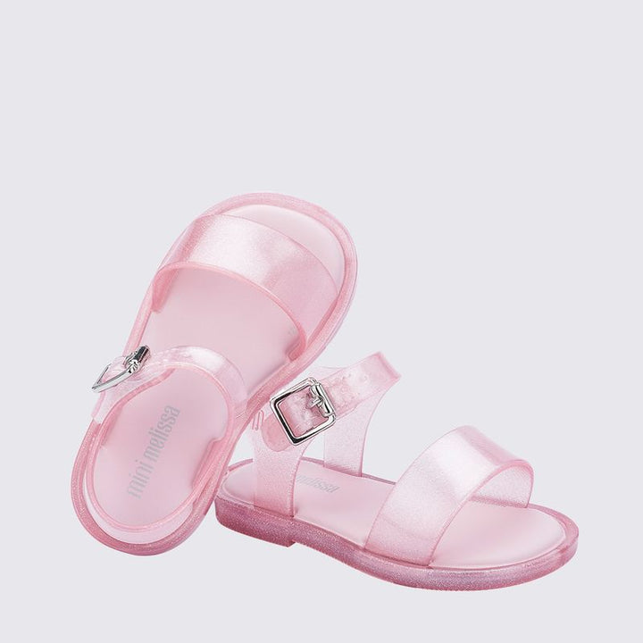 Sandália infantil Mini Melissa Mar IV Baby na cor rosa perolado com glitter, tiras em formato de concha e fecho em velcro – calçado leve, confortável e divertido para bebês.

Palavra-chave principal:
Mini Melissa Mar IV Baby

Palavras-chave relacionadas:
Sandália baby rosa glitter
Mini Melissa concha
Melissa infantil rosa perolado
Sandália com velcro
Calçado infantil confortável
Melissa 32633
Sandália temática bebê
Calçado com glitter Melissa
Melissa bebê
Sandália leve para primeiros passos