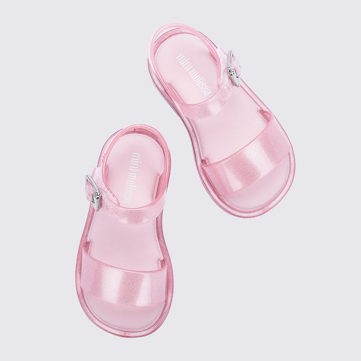 Sandália infantil Mini Melissa Mar IV Baby na cor rosa perolado com glitter, tiras em formato de concha e fecho em velcro – calçado leve, confortável e divertido para bebês.

Palavra-chave principal:
Mini Melissa Mar IV Baby

Palavras-chave relacionadas:
Sandália baby rosa glitter
Mini Melissa concha
Melissa infantil rosa perolado
Sandália com velcro
Calçado infantil confortável
Melissa 32633
Sandália temática bebê
Calçado com glitter Melissa
Melissa bebê
Sandália leve para primeiros passos