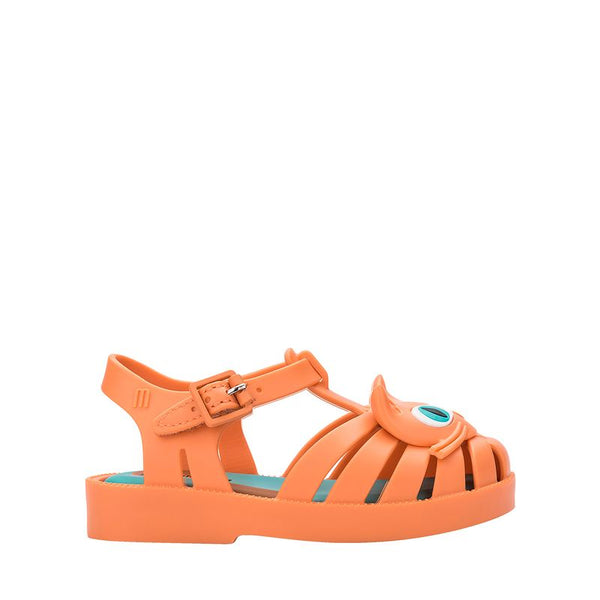 Sandália infantil Mini Melissa Possession Cat Baby nas cores laranja e azul, com aplicação de carinha de gatinho no cabedal. Confeccionada em Melflex, possui tiras vazadas, fecho com fivela e solado confortável. Um calçado divertido e estiloso para o dia a dia das crianças.

Palavra-chave principal: Mini Melissa Possession Cat Baby
Palavras-chave relacionadas: sandália infantil laranja azul, Melflex, sandália de gatinho, fecho com fivela, calçado baby confortável, estilo lúdico.