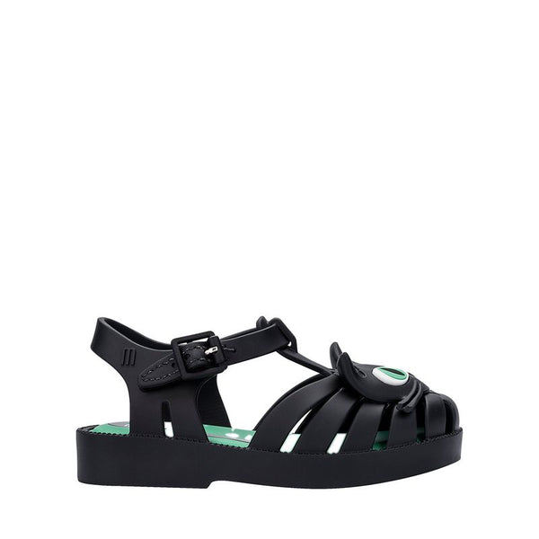 Sandália infantil Mini Melissa Possession Cat Baby nas cores preto e verde, com aplicação divertida de rosto de gatinho no cabedal. Confeccionada em Melflex, possui tiras vazadas, fecho lateral com fivela e solado confortável. Perfeita para looks lúdicos e estilosos no dia a dia.

Palavra-chave principal: Mini Melissa Possession Cat Baby
Palavras-chave relacionadas: sandália gatinho infantil, Melflex, preto e verde, fecho com fivela, calçado confortável, visual divertido, sandália baby.