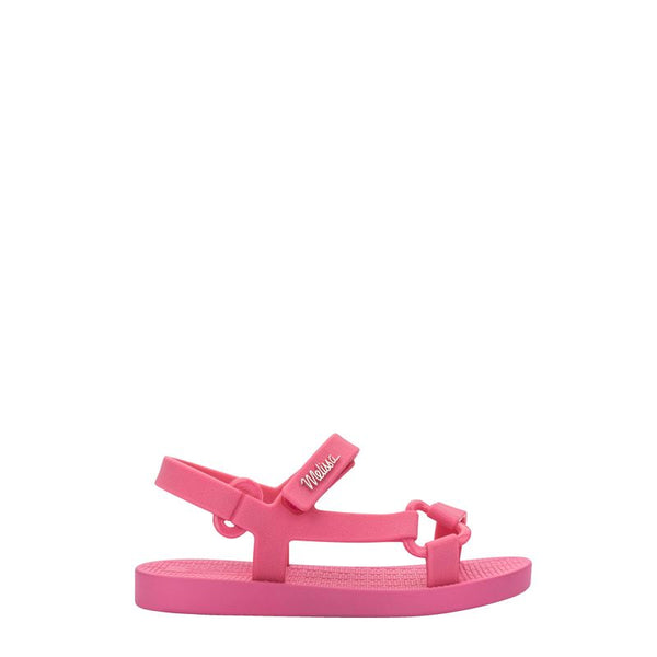Sandália infantil Mini Melissa Sun Downtown Baby na cor rosa, com acabamento fosco e design unissex. Feita em Melflex, é leve, confortável e possui fechamento em velcro para segurança dos pequenos. Ideal para dias quentes e looks combinando