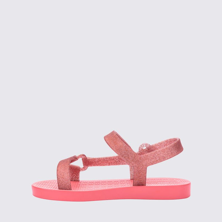 Sandália infantil Mini Melissa Sun Downtown Baby na cor rosa médio com acabamento em glitter. Modelo tipo papete, com fechamento em velcro, feita em Melflex. Leve, confortável e segura, ideal para os primeiros passos com muito brilho e estilo."

Palavra-chave principal: Mini Melissa Sun Downtown Baby
Palavras-chave relacionadas: rosa médio glitter, sandália baby, papete infantil, Melflex, fechamento em velcro, calçado infantil confortável, brilho infantil.