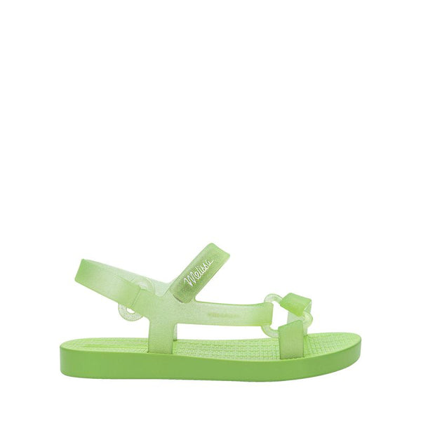 Sandália infantil Mini Melissa Sun Downtown Baby na cor verde com glitter, acabamento brilhante e design unissex. Produzida em Melflex, é leve, confortável e possui fechamento em velcro para mais segurança. Ideal para dias ensolarados e combinações
