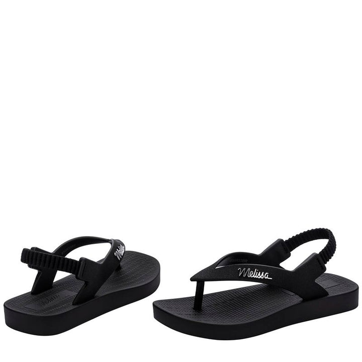 Sandália Mini Melissa Sun Long Beach Baby na cor preta, com tiras finas, fecho em velcro e solado reto – calçado leve, confortável e seguro para os primeiros passos.

Palavra-chave principal:
Mini Melissa Sun Long Beach Baby

Palavras-chave relacionadas:
Melissa 35762, sandália preta bebê, Melissa baby preta, sandália com velcro, calçado infantil confortável, Mini Melissa tiras finas, sandália leve infantil, Melissa primeiros passos, sandália prática bebê, Melissa verão criança