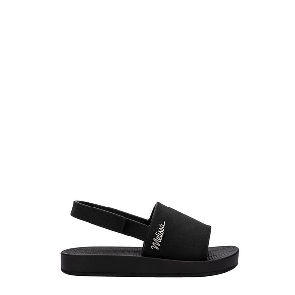 Sandália Mini Melissa Sun Sunset Baby na cor preta, com tira larga única, fechamento traseiro em velcro e solado reto – calçado leve, seguro e confortável para bebês.

Palavra-chave principal:
Mini Melissa Sun Sunset Baby

Palavras-chave relacionadas:
Melissa 35764, sandália preta bebê, slide infantil Melissa, sandália com velcro, calçado confortável baby, Melissa tira larga, sandália segura infantil, Mini Melissa preta, sandália prática bebê, Melissa primeiros passos
