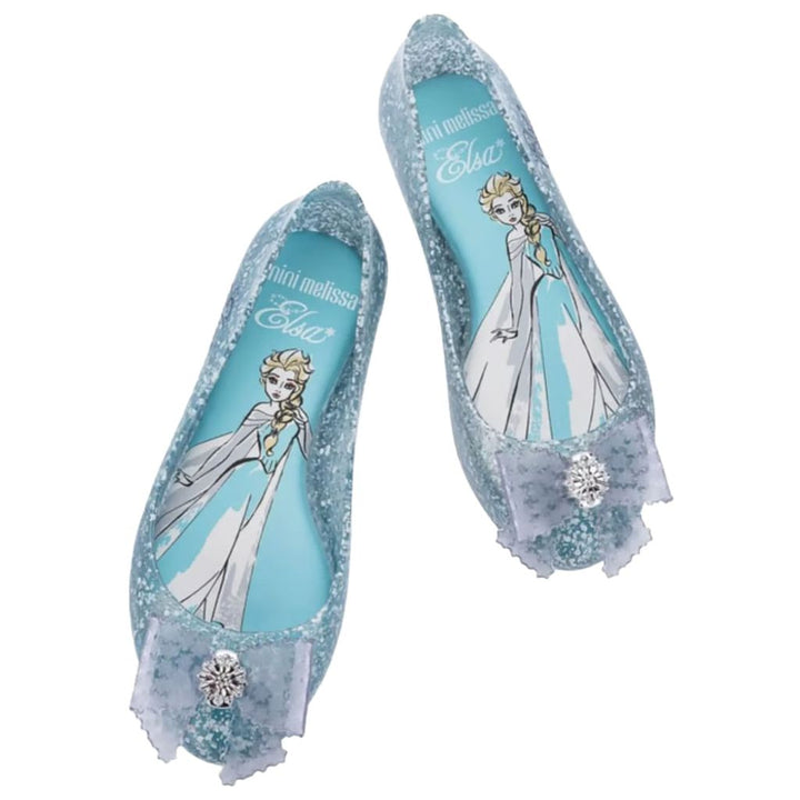 Sapatilha Mini Melissa Sweet Love + Disney Princess azul com glitter, inspirada na Elsa, com laço no cabedal e acabamento brilhante – calçado infantil delicado e confortável.

Palavra-chave principal:
Mini Melissa Sweet Love Disney Princess

Palavras-chave relacionadas:
Melissa Elsa
Sapatilha infantil azul glitter
Melissa Disney Princess
Melissa 33448
Calçado infantil princesa
Melissa Elsa azul
Sapatilha com laço
Melissa mágica
Melissa infantil confortável
Mini Melissa azul glitter