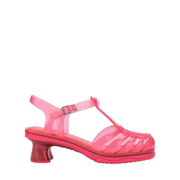 Sandália infantil Mini Melissa Vixen na cor rosa transparente, com tiras cruzadas e acabamento translúcido. Produzida em Melflex, é leve, confortável e estilosa, ideal para o dia a dia das crianças com muito charme e praticidade